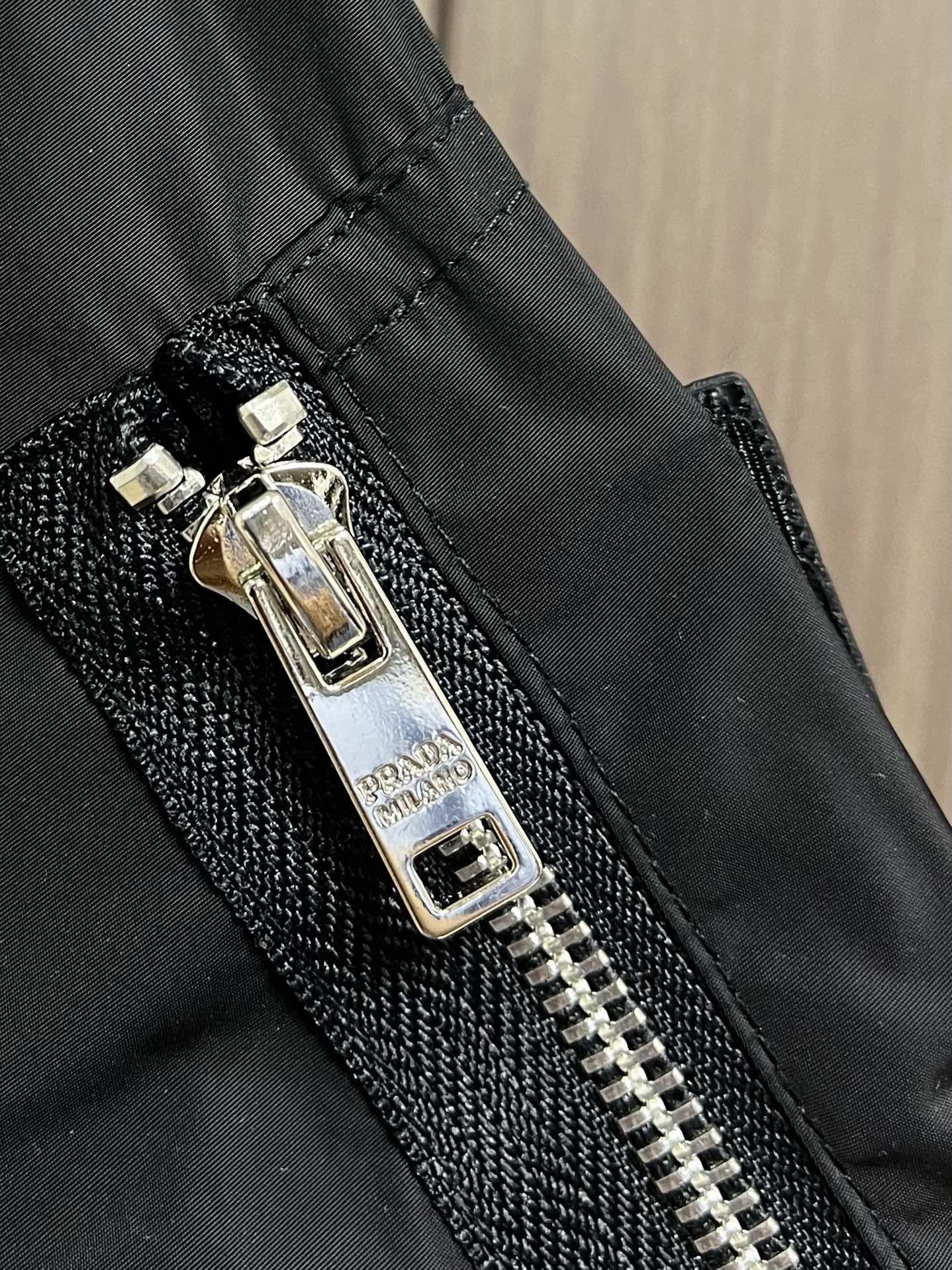 PRA* Technical fabric down jacket with hood