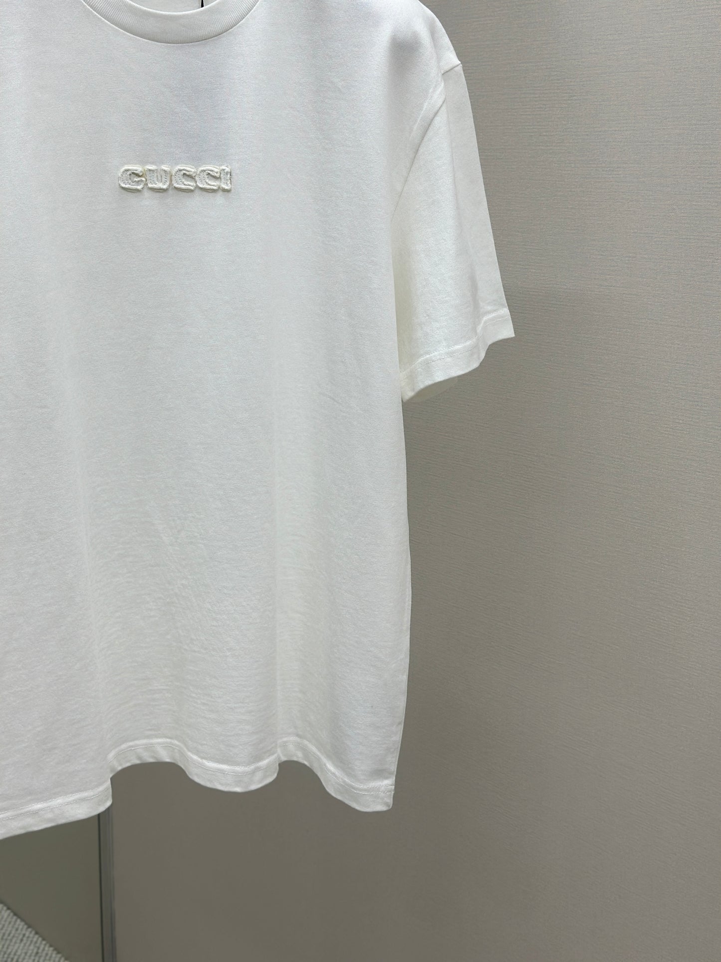 GUC* Embroidered cotton jersey T-shirt